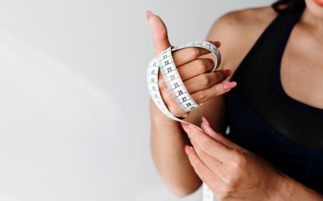 Woman holding tape measure